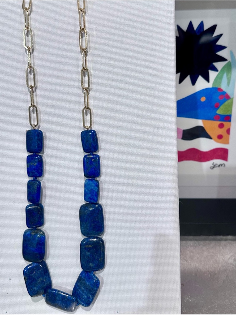 Lapis Lazuli Beaded Necklace in Deep Blue with gold accent chain.